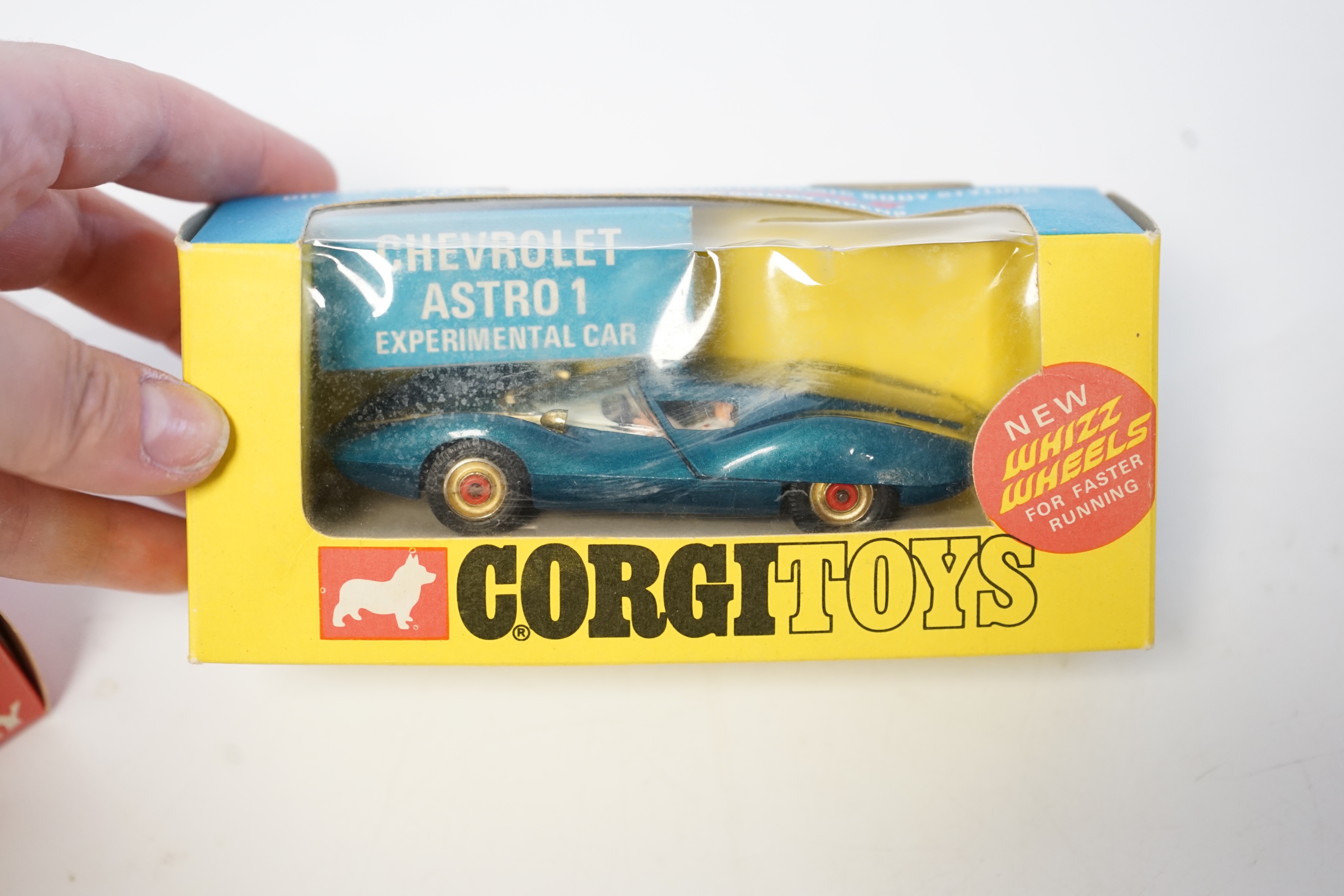 Three boxed Corgi Toys; a Proteus Campbell Bluebird land speed record car (153), a Chevrolet Astro 1 Experimental Car (347) and a James Bond 007 Citroen 2CV (51655). Condition - good